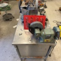 1566890-4 Collection of tools and workshop machines on workbench