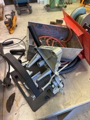 1566890-7 Collection of tools and workshop machines on workbench