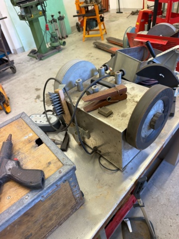 1566890-9 Collection of tools and workshop machines on workbench