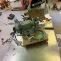 1566890-12 Collection of tools and workshop machines on workbench