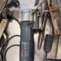 1566890-14 Collection of tools and workshop machines on workbench