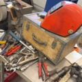 1566890-16 Collection of tools and workshop machines on workbench