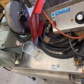 1566890-22 Collection of tools and workshop machines on workbench