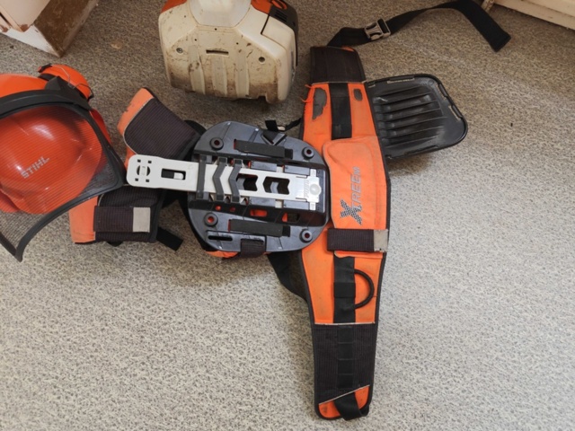 1485782-4 Stihl brushcutter with harness and helmet