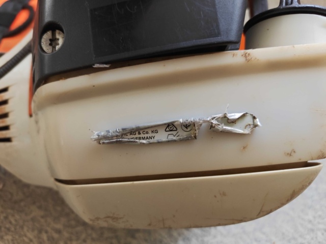 1485782-8 Stihl brushcutter with harness and helmet
