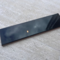 1563383-2 Långsmalt svart kakel med blank yta. Storlek: 10x40 cm
