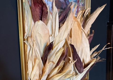Collection of wall decorations and paintings with botanical elements