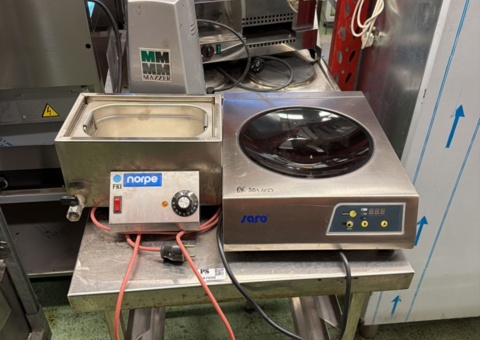 Induction wok, heating element, coffee grinder and stainless steel bench