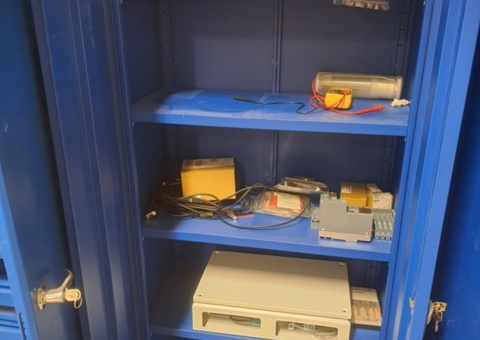 Tin cabinet with contents