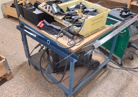 Work cart with various objects (Not the machine)