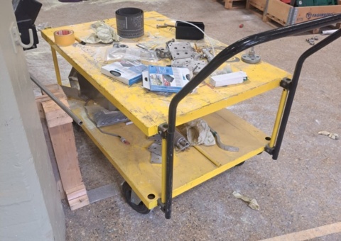 Work cart with various objects (Not the machine)