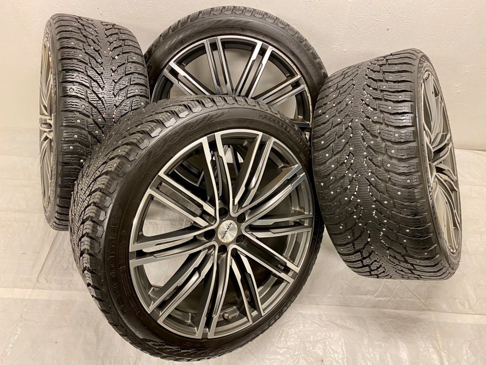 1580527-1 21" Winter wheels with Nokian studded tires