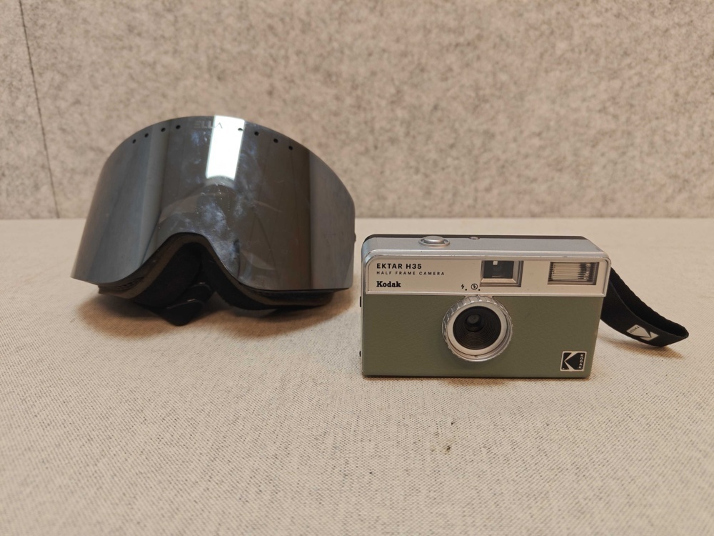 1485808-1 Ella ski goggles and Kodak analog camera