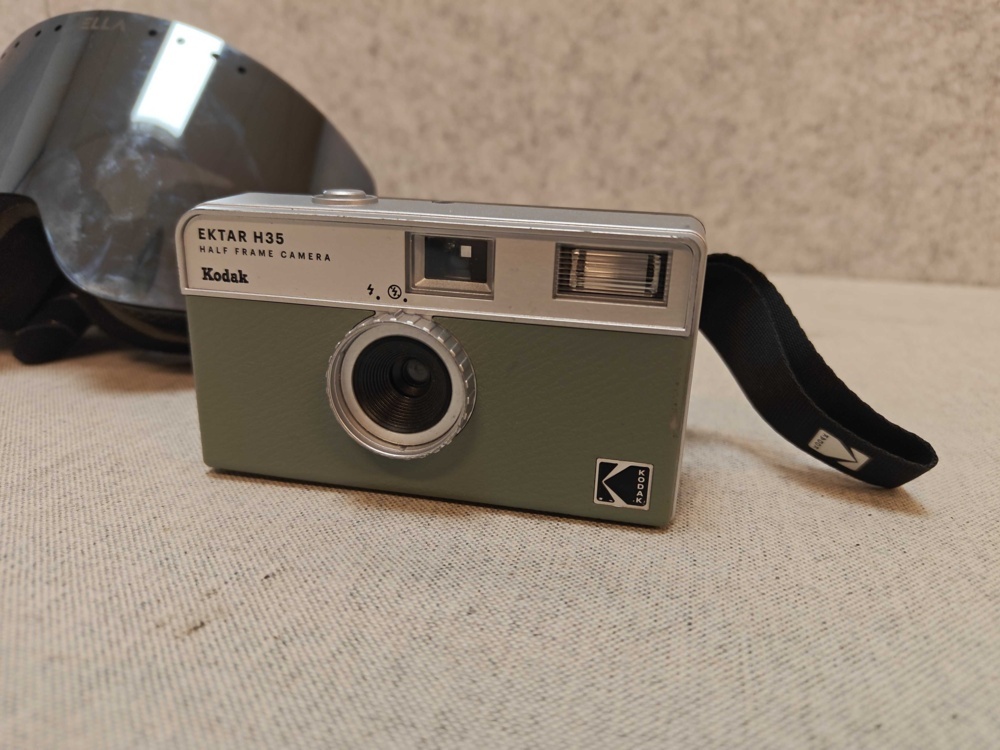 1485808-2 Ella ski goggles and Kodak analog camera