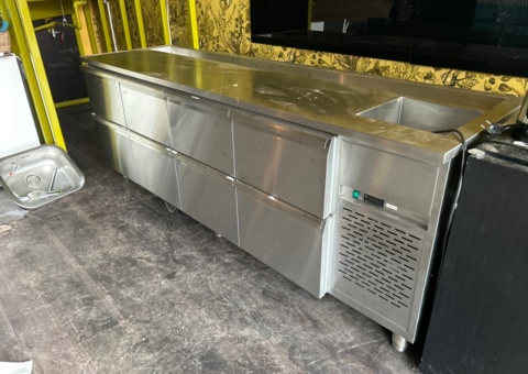 Refrigerated counter with drawers and drainer, stainless steel sink