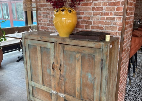Sideboard and vase