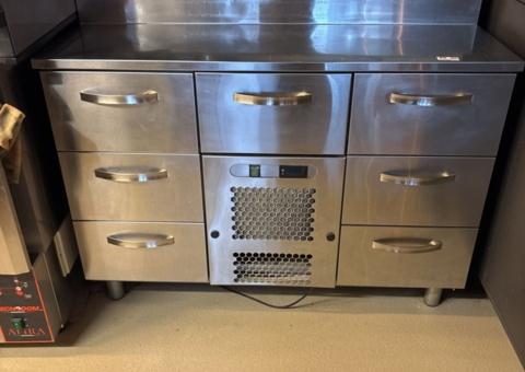 Refrigerated counter with cooling channel and drawers