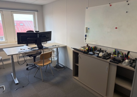Office workplace with furniture and screens
