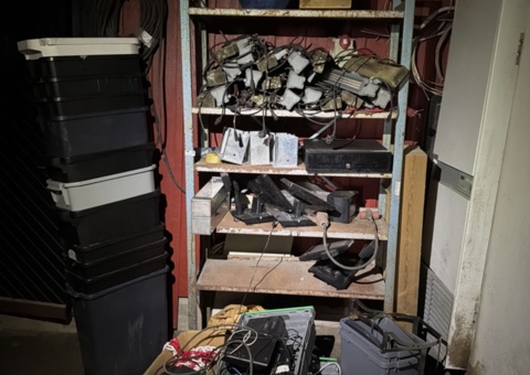 Collection of older restaurant electronics, lighting and trash cans
