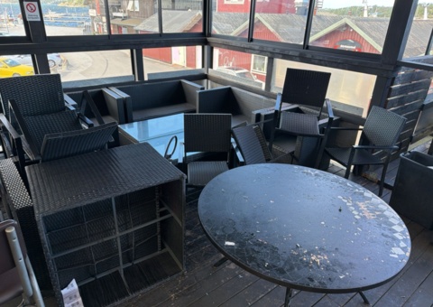 Large collection of restaurant furniture in artificial rattan and high tables and chairs