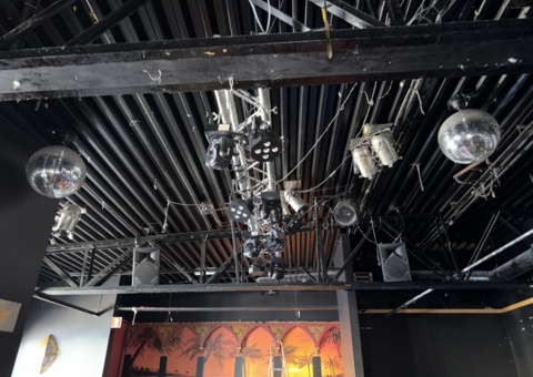 Collection of various sound and lighting equipment from dance floors