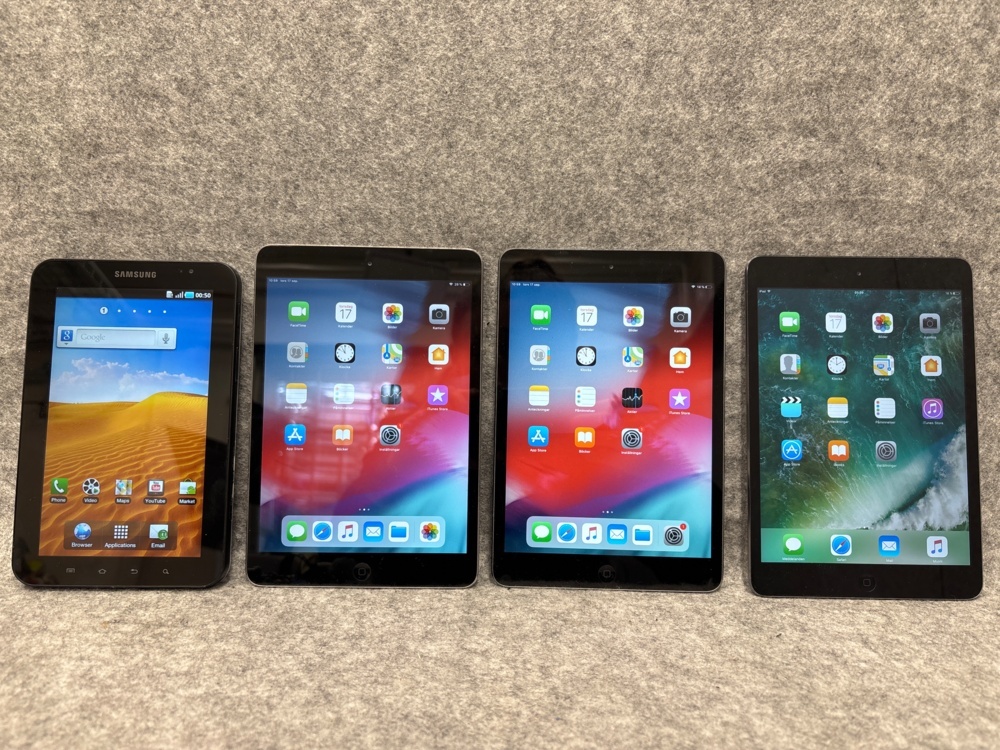 1545885-1 3 IPad mini 2 and 1 Samsung galaxy tab