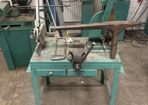 Workbench with guide clip, bench shears, hand press, vice and sheet metal anvil