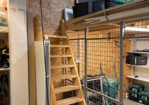 Building supplies and computer monitors on the mezzanine floor