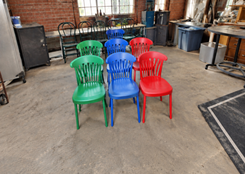 Colorful chairs with solid oak table
