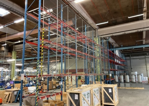 Pallet racking with shelves and fall protection
