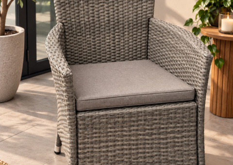 Gray synthetic rattan armchair with cushion