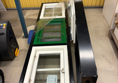 Window display stand with four different windows