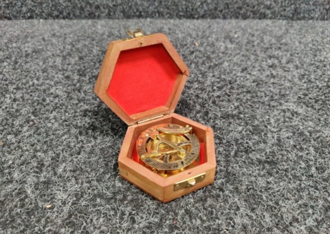 Brass sun compass with hexagonal wooden box