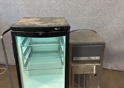 Lot of commercial kitchen equipment - beverage cooler, ice maker, grill station, etc.