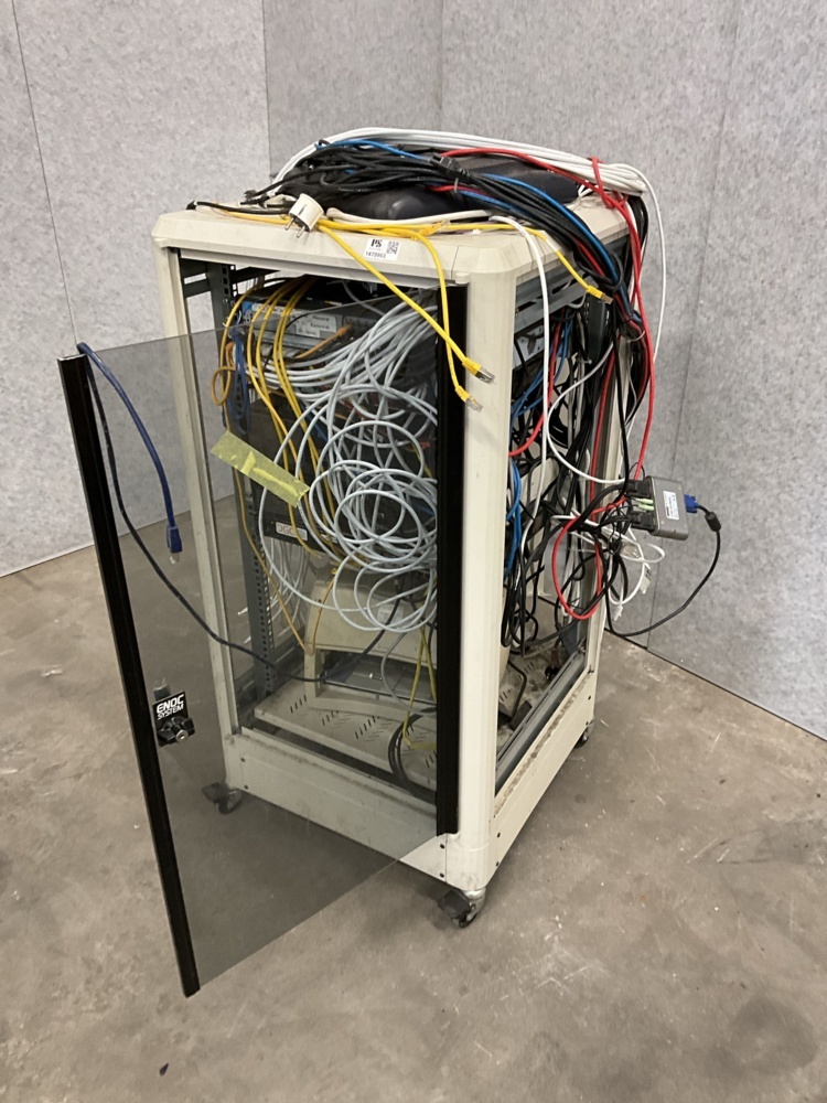 1473963-2 Computer cabinet with various items