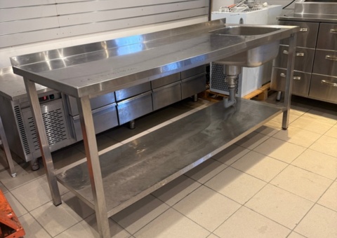 Sink with large bowl, lower shelf and folded back edge. Approx. 195x70x90 cm