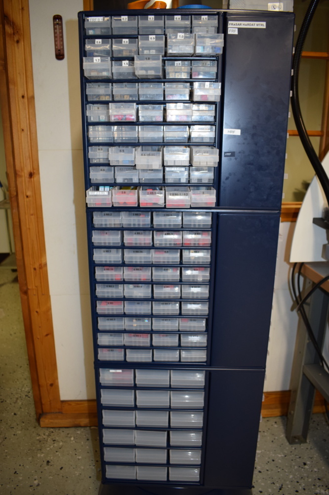 1452858-1 4-sided assortment cabinet on wheels with various hardened materials etc.