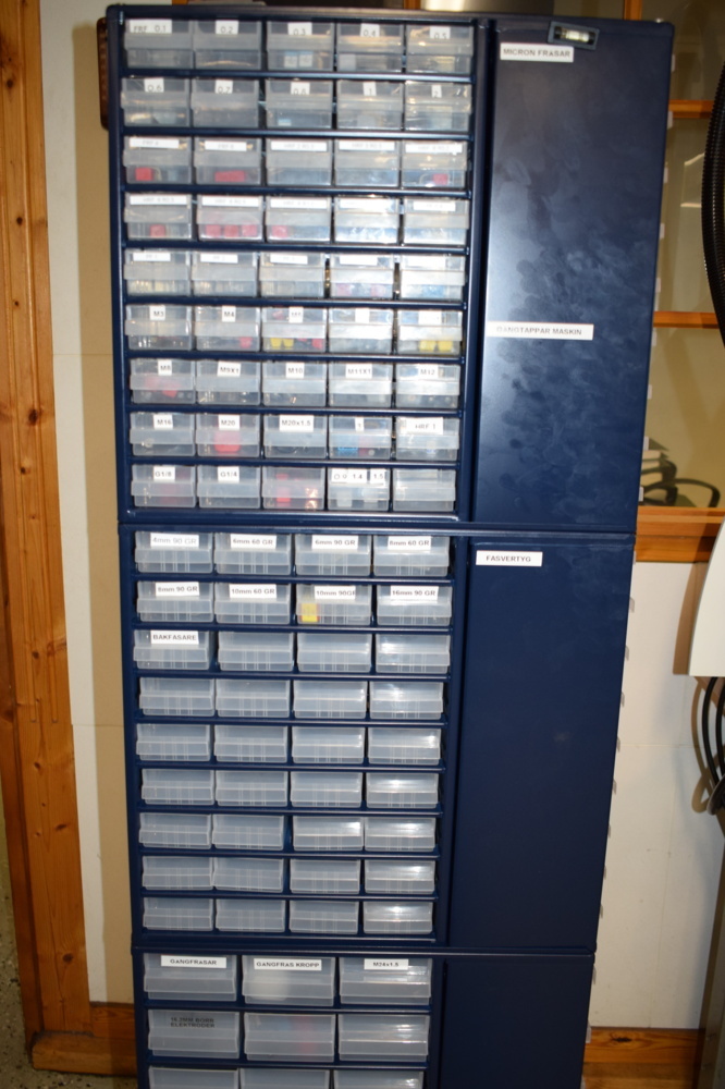1452858-2 4-sided assortment cabinet on wheels with various hardened materials etc.