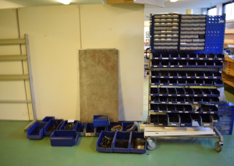 Material rack with screw and bolt