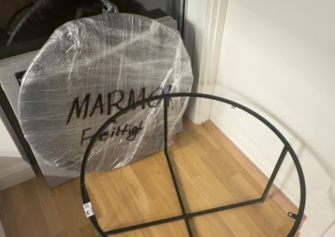 Round coffee table with marble top