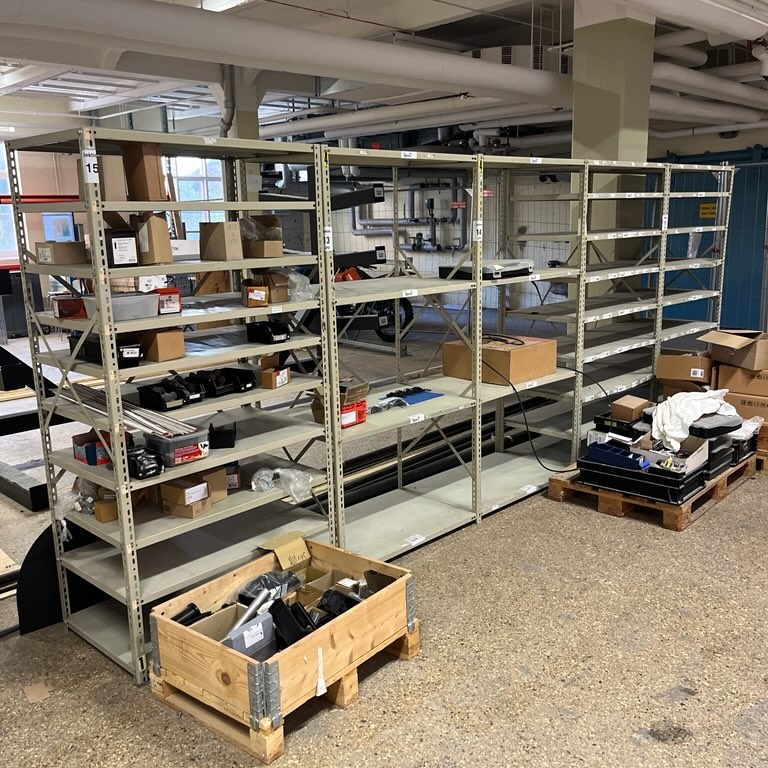 1580570-1 Sheet metal shelves with screws, bolts, electrical parts, pneumatics, etc.