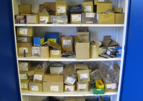 Tin cabinet with contents