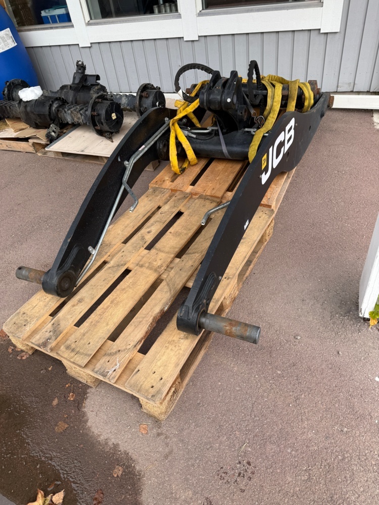 1352398-1 Lastarmar med snabbfäste till JCB 409 frontlastare