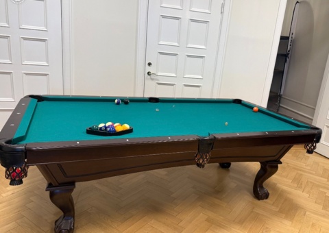 Pool table with table tennis accessories