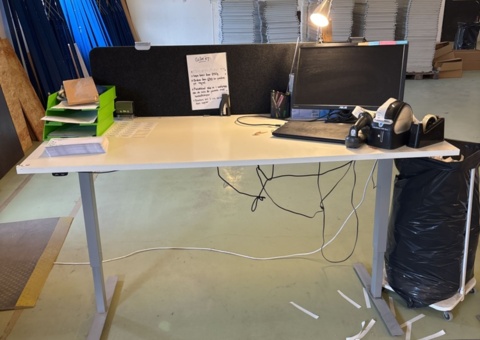Workstation with electric desk, monitor, label printer, etc.