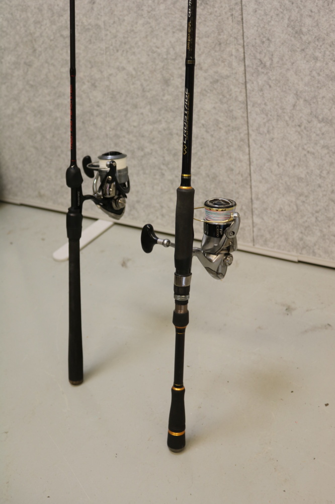 1515257-2 2 fishing rods with reels.