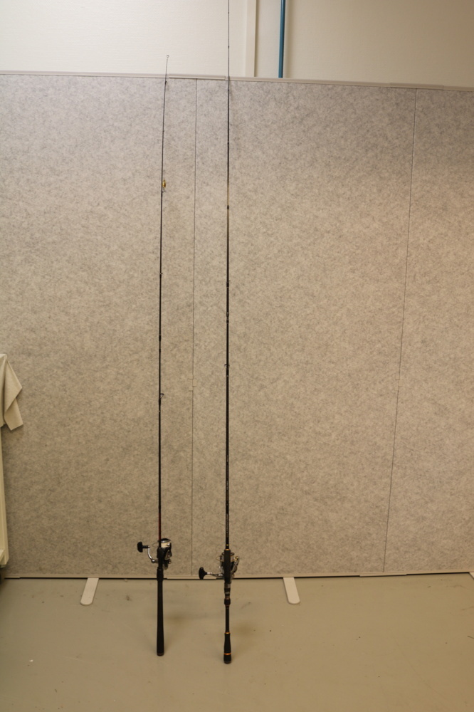 1515257-3 2 fishing rods with reels.