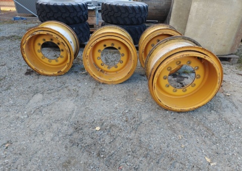 Four rims Volvo L60F