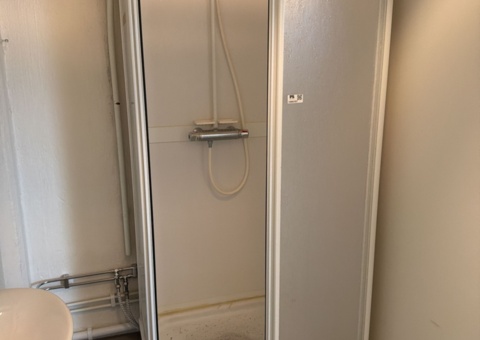 Shower cabin with shower mixer, hand shower and shower walls