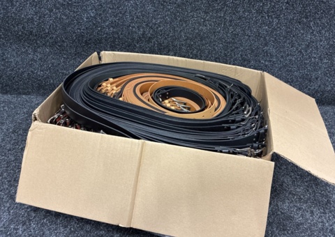 Approximately 193 leather belts, sizes 80-115